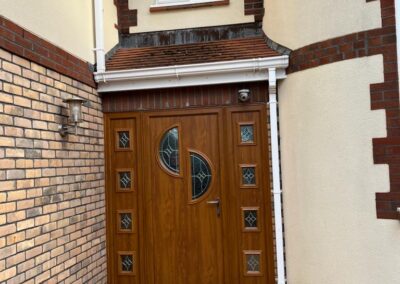 Oak Meron Composite door and matching sidelights fitted in Broadstone