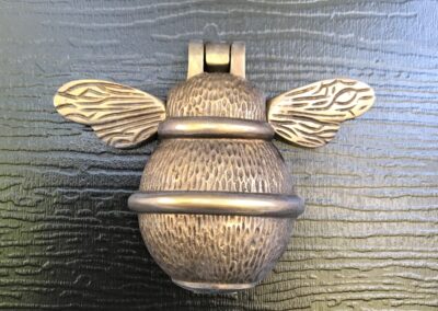 Bee knocker (brass) - close up