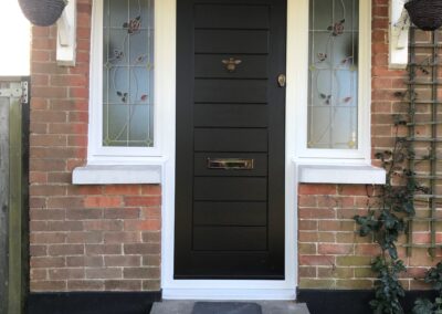 Black composite door fitted in Broadstone