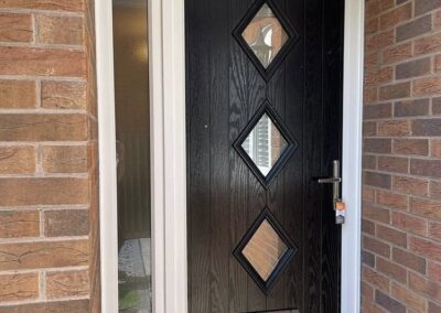 Black composite doors 3 triangle style Dorset