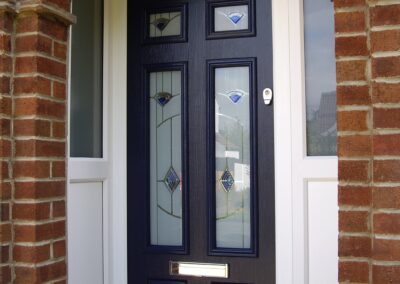 Blue composite doorwith murano glass