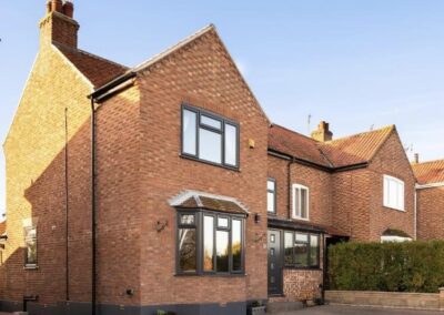 Grey UPVC windows and bay