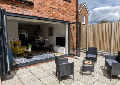 Grey aluminium bi-fold doors fitted in Poole, Dorset