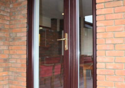 Rosewood UPVC door, white inside, fitted in Broadstone, Dorset