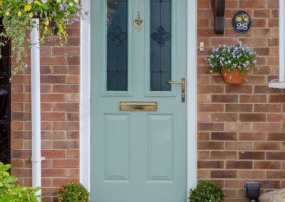Chartwell Green composite door with Spring glass