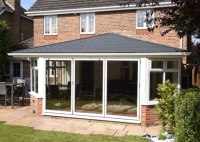 Ultra Tiled roof with aluminium bi fold doors Dorset