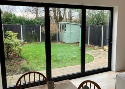 Smart black bi-folds installed Bournemouth